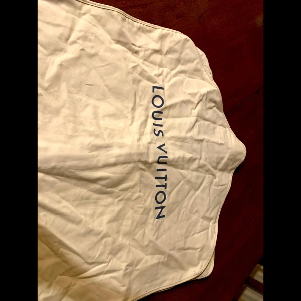 Brand new authentic Luise Vuitton dust cover